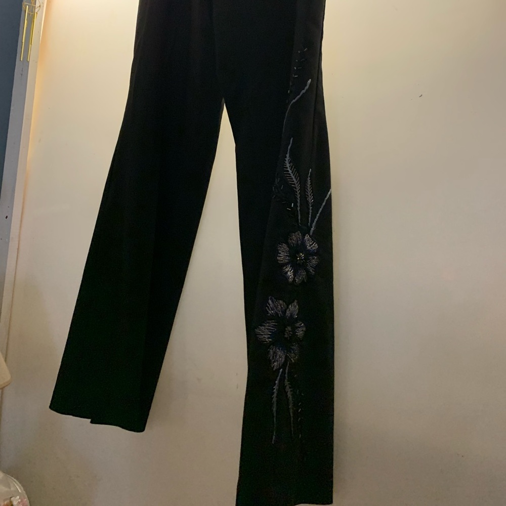 These dress pants tho! Beaded detail on the right leg